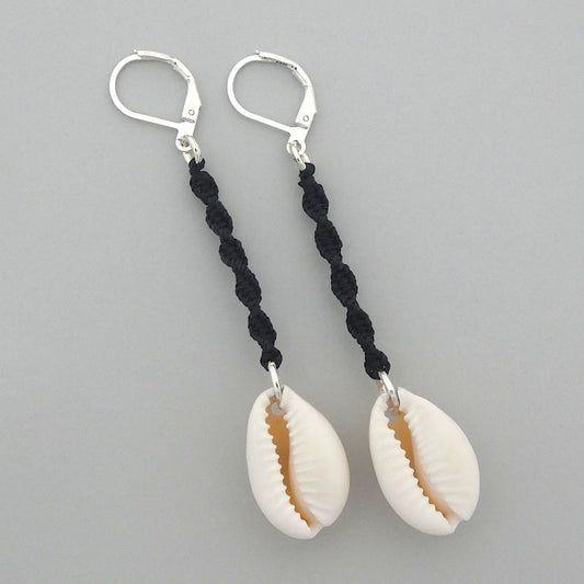 Silver plated leverback earrings with cowrie shells and black macramé twist detail.