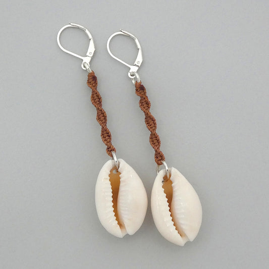 Silver plated leverback earrings with cowrie shells and copper coloured macramé twist detail.